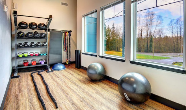 Fitness Center Large fitness center with large windows and plenty of equipment